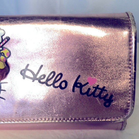 HELLO KITTY metallic pink wallet. Holds up to 16 cards. Polka dot lining inside. - Picture 16 of 16